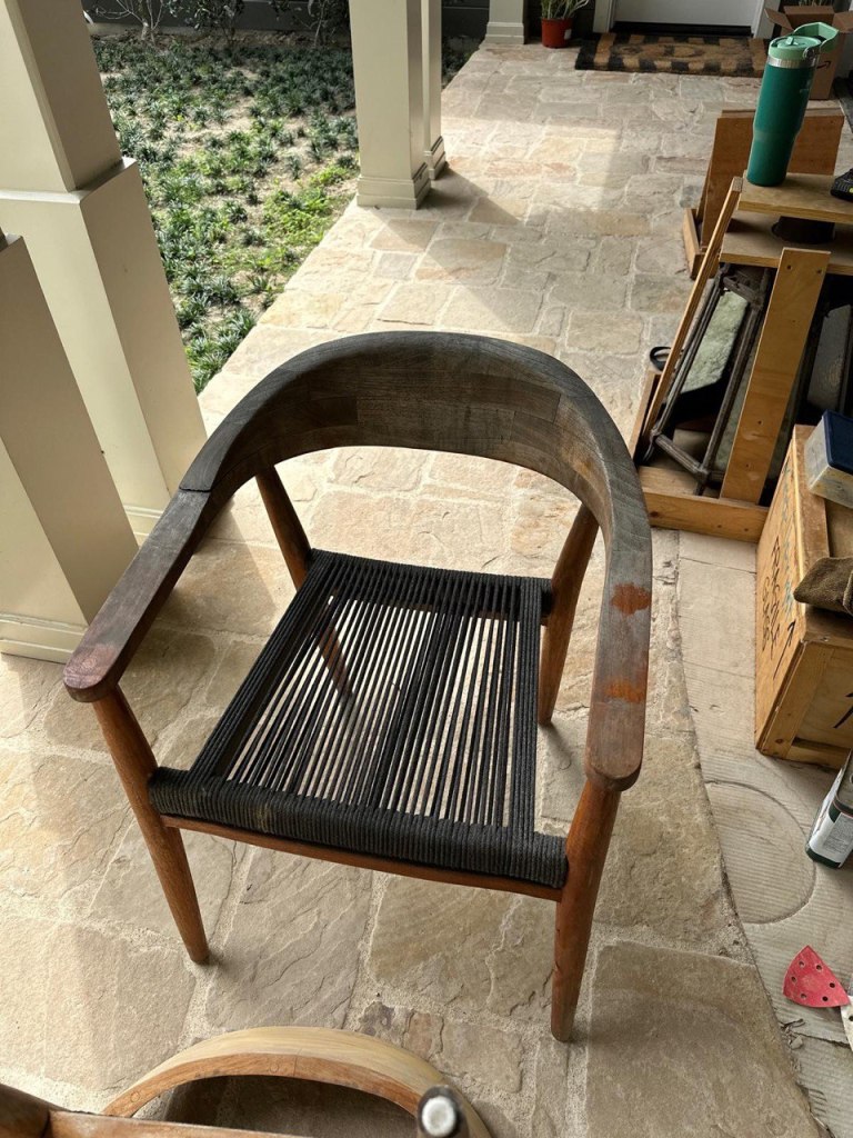 Outdoor wooden chair before restoration in Toluca Lake