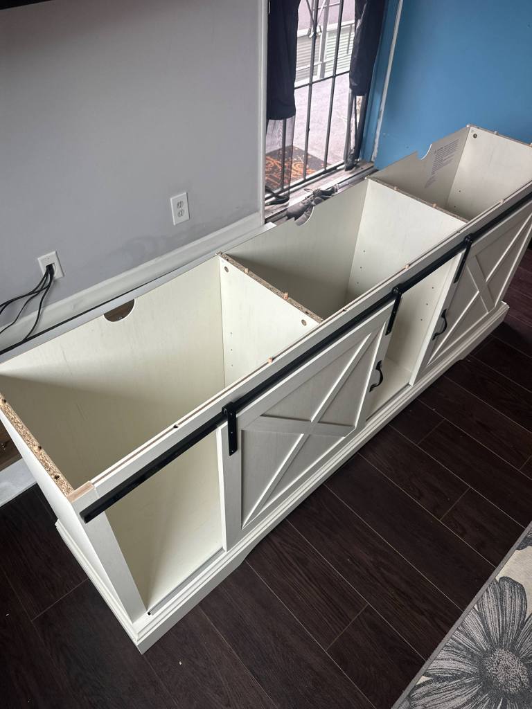 Sliding barn door console cabinet assembly in Sherman Oaks
