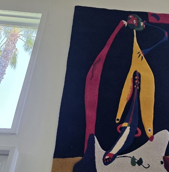 Close-up detail of a large tapestry rehung in Toluca Lake